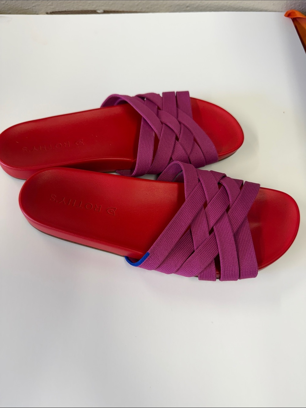 Rothy's Braided Slide Sandals in Pink and Red